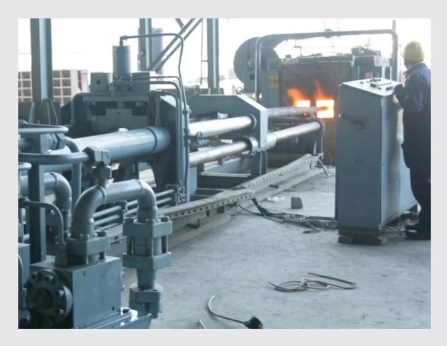 Elbow hot forming line — P.K. Tubes & Fittings manufacturing facility.