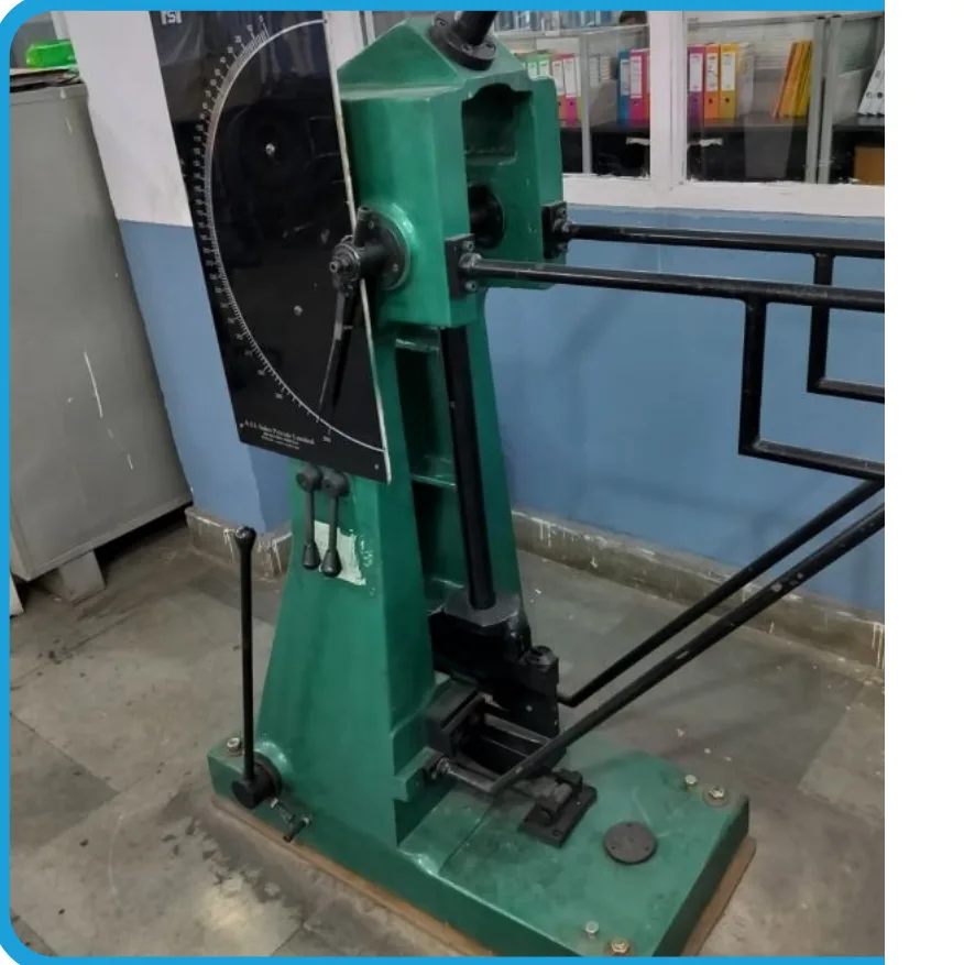 Impact Testing Machine equipment at P.K. Tubes & Fittings.